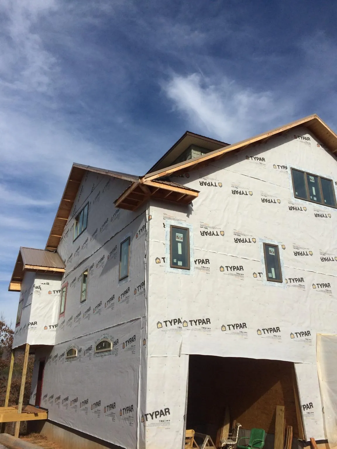 Stick built house wrapped in Typar with new roof framing and dormers in Sunland